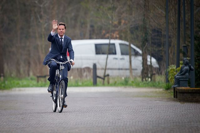 A Picture of Prime Minister Mark Rutte Riding a Bike