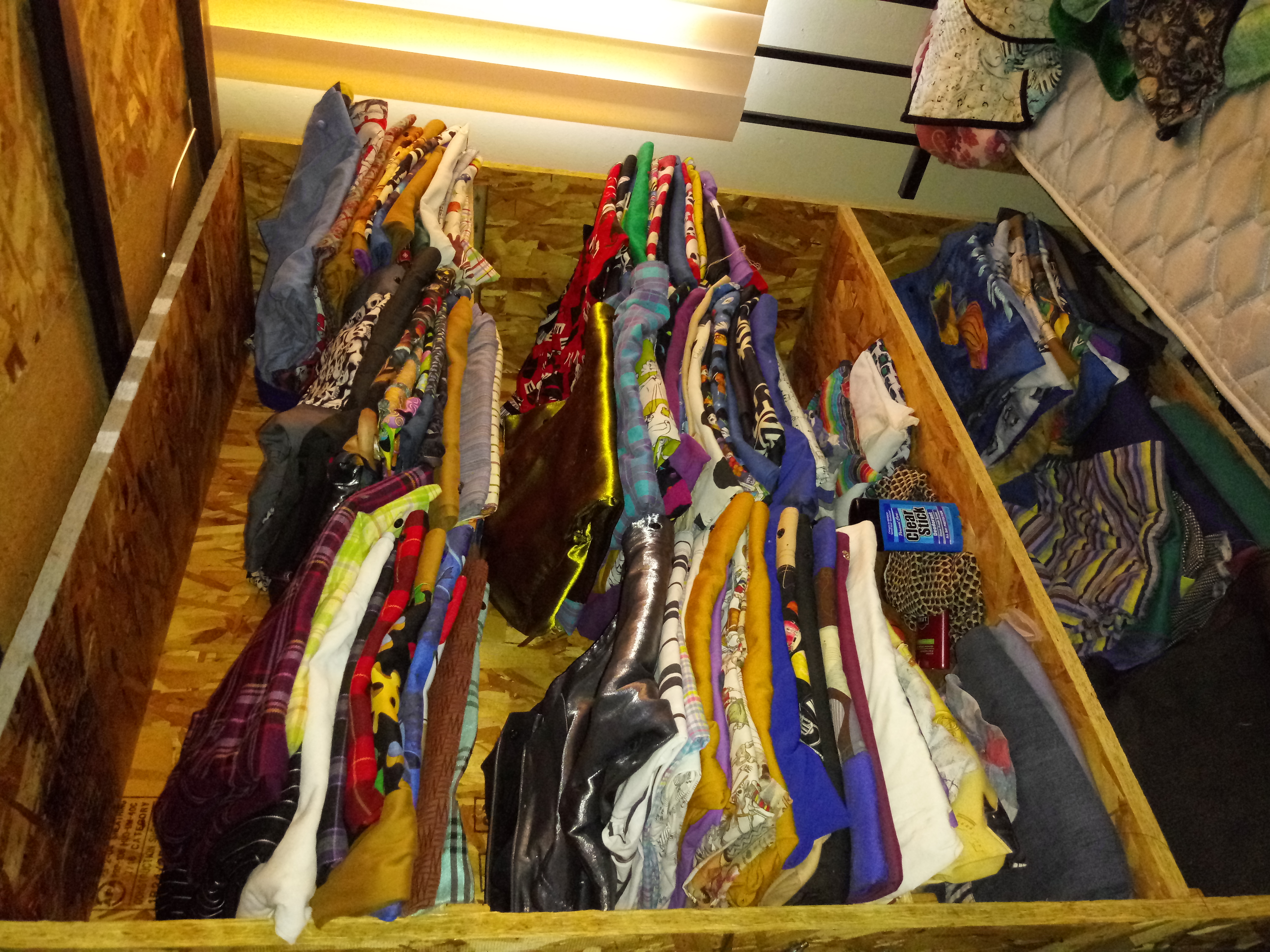 Shelf full of beautiful, handmade dress shirts.